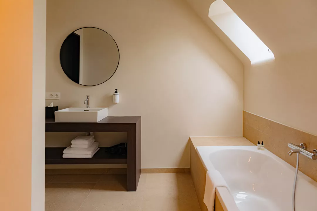 Bathroom with bathtub and shower